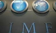 Emas Menguat Tipis Terkait Pemangkasan Proyeksi IMF